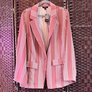 Light pink blazer perfect for a statement